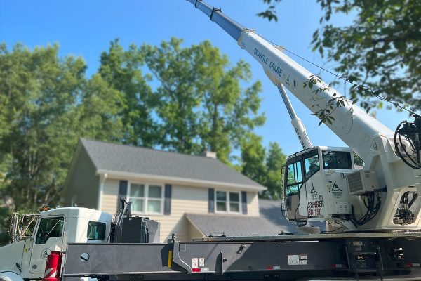 triangle crane white crane truck in action